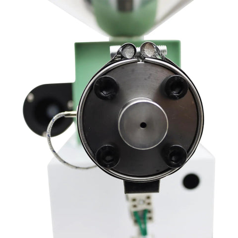 Close-up view of the output nozzle on the Pro Grade Single Screw Filament Extruder Cranks Out 3D Printer Material From PEEK ABS PLA PETG TPU TPE Without The Hassle And Features A Beefy One Inch Screw Pulling Smooth Hot Plastic Wire Fast On 110V.