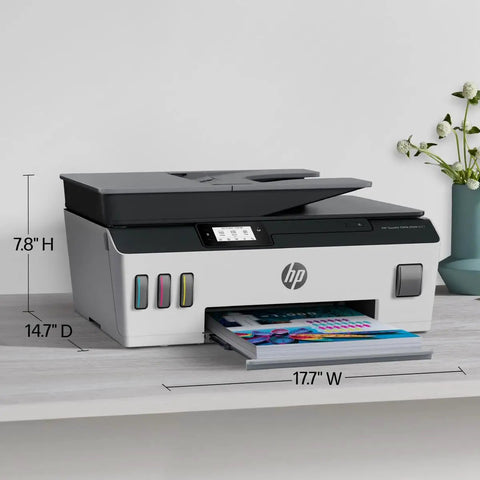 Wireless All-In-One Printer With Refillable Ink Tanks, 2 Years Of Ink Included on a desk with paper tray extended