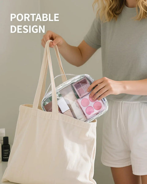 Person placing TSA Approved Clear Toiletry Bag For Carry On, Waterproof PVC Cosmetic Organizer into tote bag