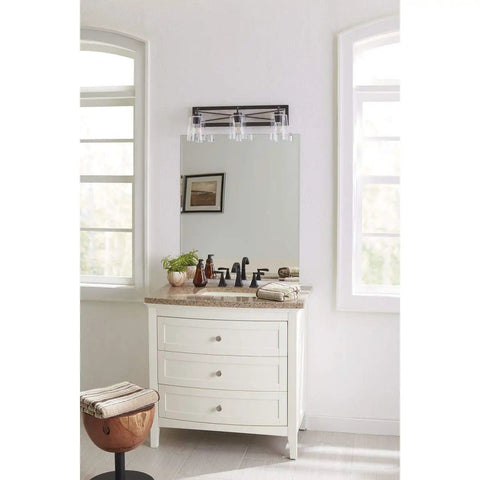 Bathroom showcasing Three-Light Coastal Bath Vanity Light with Clear Glass, Rustic X-Brace Design over mirror, faux woodgrain backplate