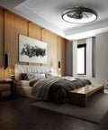 Bedroom with dimmable LED ceiling fan with remote, 5 blade black low profile semi flush mount, 21.5 inch, above bed.
