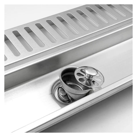 Smooth Brushed Rose Gold Bathroom Shower Drain Rectangular Floor Hair Catcher Filter Tool Free Cleaning Hook No Sweat Setup Dead Simple Cleanup Slick Stainless Steel Waste Grate 600 Mm close-up showing hair catcher and grate design.
