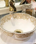 USZWBY Bathroom Vessel Sink, Countertop Basin Ceramic Sink with ornate gold design, round shape, elegant bathroom fixture.