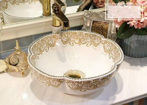 USZWBY Bathroom Vessel Sink, Countertop Basin Ceramic Sink with ornate gold design, round shape, elegant bathroom fixture.