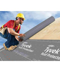 Heavy Duty Roofing Underlayment Roll 42 X 286 Feet With Rock Solid Tear Resistance being installed on a roof.
