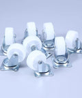 8 Pcs Inch Swivel PP Caster Wheels for Furniture and Workbench, white wheels with silver metal bases, ideal for smooth movement.