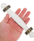 Person holding a Slick Vintage Zinc Alloy Cabinet Pull with White PU Leather Grip
