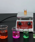 Graduated Borosilicate Glass Beaker Set In Five Sizes 5 Ml, 10 Ml, 25 Ml, 50 Ml, And 100 Ml For Lab Or Home Chemistry Gear with liquids