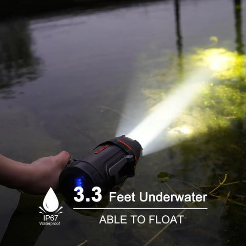 Hand using 2000 Lumen Marine Spotlight Waterproof Rechargeable Handheld Flashlight For Boats With IP67 Rating in water, floating