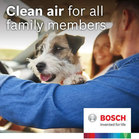 Family and dog in car with Bosch logo, highlighting clean air benefits from HEPA Cabin Air Filter for Acura and Honda cars.