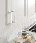 Polished Chrome Cabinet Pull for Cabinets and Furniture, 5-1/16 Inch Center-to-Center, 5-7/8 Inch Overall Length, Blackrock Collection, Transitional Drawer Handle, 1 Pack, Versatile Kitchen and Bath Hardware on white cabinet doors in kitchen