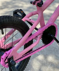 Pink Solid Toddler Bicycle Chain Cover Snap On No Tools Required Protects Clothing From Chain Lube For Single Speed And Fixed Gear Bikes Only Easy Installation on pink bike frame.
