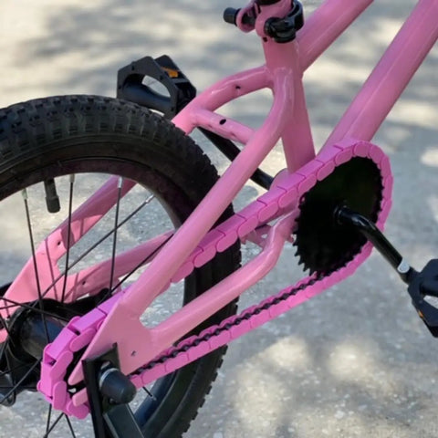 Pink Solid Toddler Bicycle Chain Cover Snap On No Tools Required Protects Clothing From Chain Lube For Single Speed And Fixed Gear Bikes Only Easy Installation on pink bike frame.