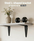 Steel L-shaped bracket supporting a shelf with a vase and dumbbell, showing 100 lb capacity, 16 Pack Heavy Duty Metal Floating Shelf Brackets 6x8 Inch Black L Shaped Shelf Supports For Home Office Kitchen Desk Mounting With Wall Anchors And Screws
