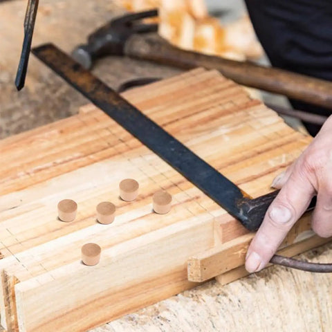 Pro Grade 50 Piece Wood Plug Set for Screw Holes and Carpenter Bee Repair in woodworking setup with khaki plugs and tools.