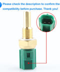 Coolant temperature sensor (ECT) with brass threaded probe and green plastic connector.