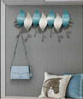 Heavy Duty Wall Mounted Coat Hook With Snowflake Design Iron Wall Hook For Entryway And Bathroom Rust Resistant Metal Hanger For Scarves Umbrellas Bags Keys And Hats Single Unit Silver Finish Home Decor Space Saver, decorative hooks with blue and white leaf patterns.