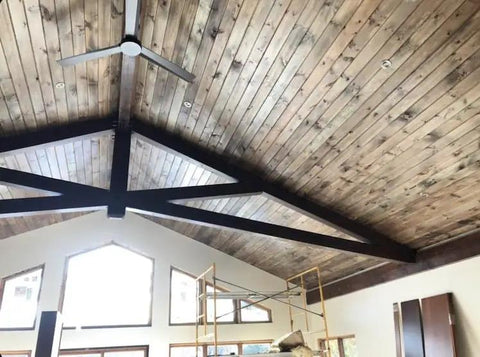 Buckwild Aging Wood Stain Drops Real Barnwood Charm On Any Deck Making Weathering A Hassle Free Experience visible on vaulted wood ceiling.