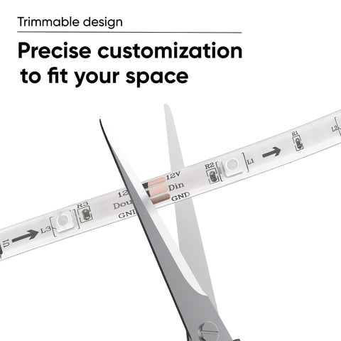 Scissors trimming Smart LED Light Strip Pro 32.8ft WiFi RGB Strip With 16 Million Colors for precise customization.