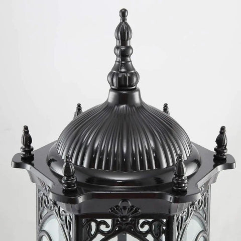 Top view of JUDYSSY Security Lights Outdoor/lot Led Flood Light with ornate black design and pointed finial.
