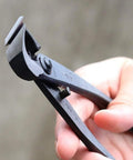 Pro Grade Bonsai Tool Kit 4 Piece Set With Yasugi Steel Satsuki Bonsai Scissors 8 Inch Concave Cutter in hand for trimming