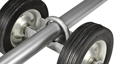 Close-up of Workhorse 2 Pack 6 Inch Sliding Fence Gate Wheels with galvanized steel and rubber components for chain link fences.