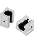 Heavy Duty SCS12LUU 300mm Linear Rails With SBR12UU Slide Blocks close-up of two aluminum bearing blocks