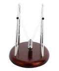 Newton Cradle Desk Toy With Classic Pendulums And Gentle Clinking on wooden base for home office decor stress relief focus boost.