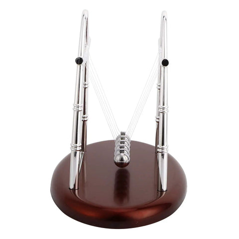 Newton Cradle Desk Toy With Classic Pendulums And Gentle Clinking on wooden base for home office decor stress relief focus boost.