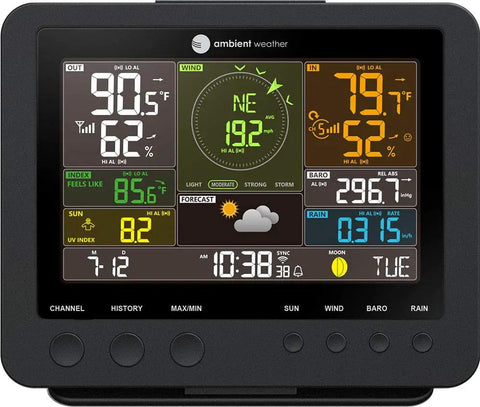 Smart Weather Station Setup Ready With WiFi Remote Monitoring And Alerts For Home And Backyard Indoor Outdoor Sensor Array With Rain Gauge Wind Speed And Direction Temperature Humidity UV And Solar Radiation Feels Like Forecast And Color LCD Display showing weather data on screen.