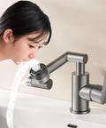 Adjustable 360 ° Swivel Kitchen Faucet with 4m Jet Retractable Robotic Arm Black Finish being used for rinsing water.