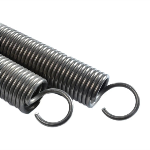 Close-up of extension compression springs kit with 1.2mm wire diameter and 12mm outer diameter, showing steel hook ends