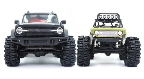 Front view of two RC crawler vehicles with 1.0 Crawler Tires 64x25mm Mud Slingers Super Soft Sticky For RC Crawlers 1 By 18 TRX4M 1 By 24