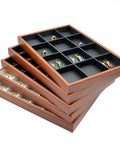Super Dope 24 Grid Jewelry Organizer Tray designed for keeping necklaces rings bracelets makeup brushes keys and wallets securely tucked away daily, featuring multiple compartments.