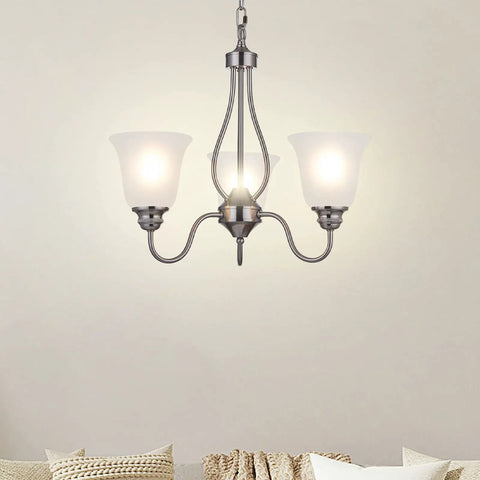 Lit Three Light Chandelier In Brushed Nickel With Frosted Glass Shades, Classic Ceiling Fixture in living room setting