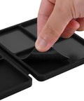 Hand lifting magnetic sheet on Portable Tri Fold Silicone Tool Tray With Magnetic Sheets Included Heat Resistant And Flame Retardant
