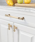 10 Pack 5 Inch Brushed Brass Cabinet Handles 128mm Gold Kitchen Cabinet Pulls installed on white cupboard doors