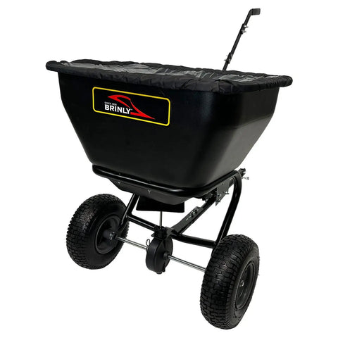 Deluxe Tow Behind Broadcast Spreader With Extended Easy Reach Handle And Weatherproof Cover, 175 lb capacity, black hopper
