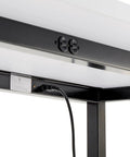 Top Shelf Standing Bar Table With Twelve Built In AC Outlets And Sturdy Footrest showing power outlets and cord underneath.