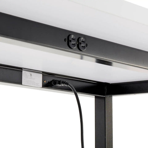 Top Shelf Standing Bar Table With Twelve Built In AC Outlets And Sturdy Footrest showing power outlets and cord underneath.