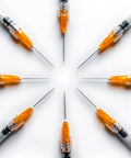 Premium 100 Pack 1Ml Luer Lock Syringes With 25Gauge Needles, heavy duty syringes arranged in a circular pattern on white background.