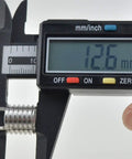 Digital caliper measuring 12.6 mm on Key Locking Thread Inserts For Repair Stripped Internal Threads Restore Strength In Industrial Equipment