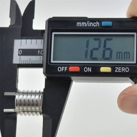 Digital caliper measuring 12.6 mm on Key Locking Thread Inserts For Repair Stripped Internal Threads Restore Strength In Industrial Equipment