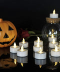 Battery Operated Flameless LED Tea Lights 24 Pack Realistic Flicker Votive Candles with pumpkin and rose decor