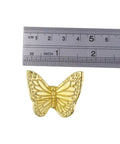 Butterfly Drawer Knobs Set Of 6 In Dope Gold Brass Finish For Cabinets shown with ruler for scale.