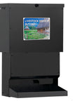 Metal Tough Galvanized Steel Deer Feeder Holds Fifty Pounds Of Corn Or Protein Mix Rust Proof Wild Game Feed Dispenser Trail Ready Outdoor Hunting Essential in black with a front drop area.