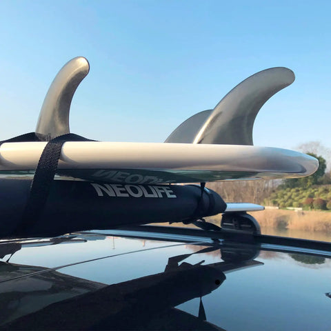 Soft Roof Rack Pads With Two 15 Ft Tie Down Straps For Surfboard, SUP Paddleboard, And Snowboard, installed on a car