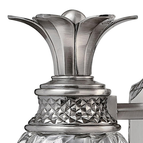 Close-up of Plantation Style One Light Bathroom Vanity Fixture In Polished Antique Nickel With Silver Patina Finish detailing.