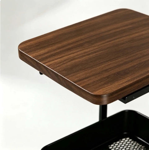 Close-up of solid wood top on the Versatile 2 Tier Rolling Utility Cart With Solid Wood Top And Reinforced Steel Mesh Basket Hella Sturdy Storage Trolley.