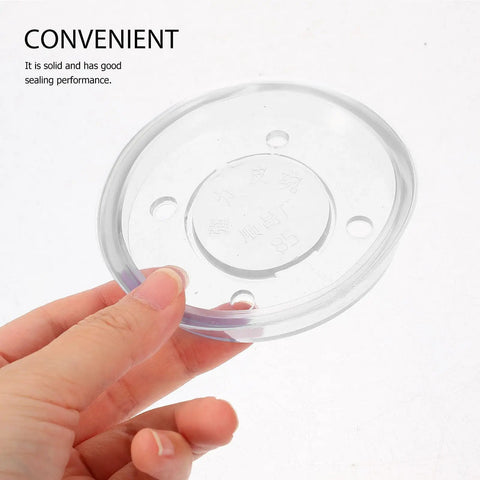 Hand holding a clear part of the Four Piece Pitcher Pump Gasket Set For Hand Water Pumps White PVC Sealing Gaskets